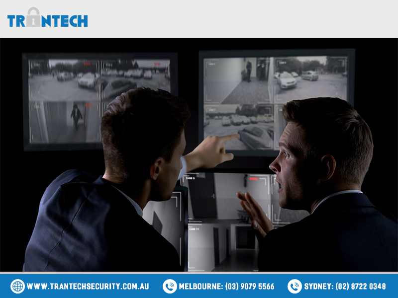 Private agents monitoring CCTV footage, searching for criminals, discussion Private agents monitoring CCTV footage, searching for criminals, discussion